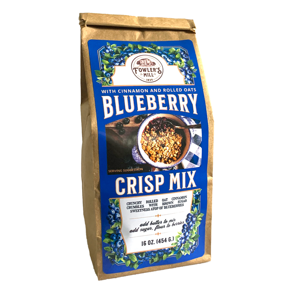Front of Fowler's Mill Blueberry Crisp Mix paper bag with glossy label including a pile of blueberries and a blueberry crisp.