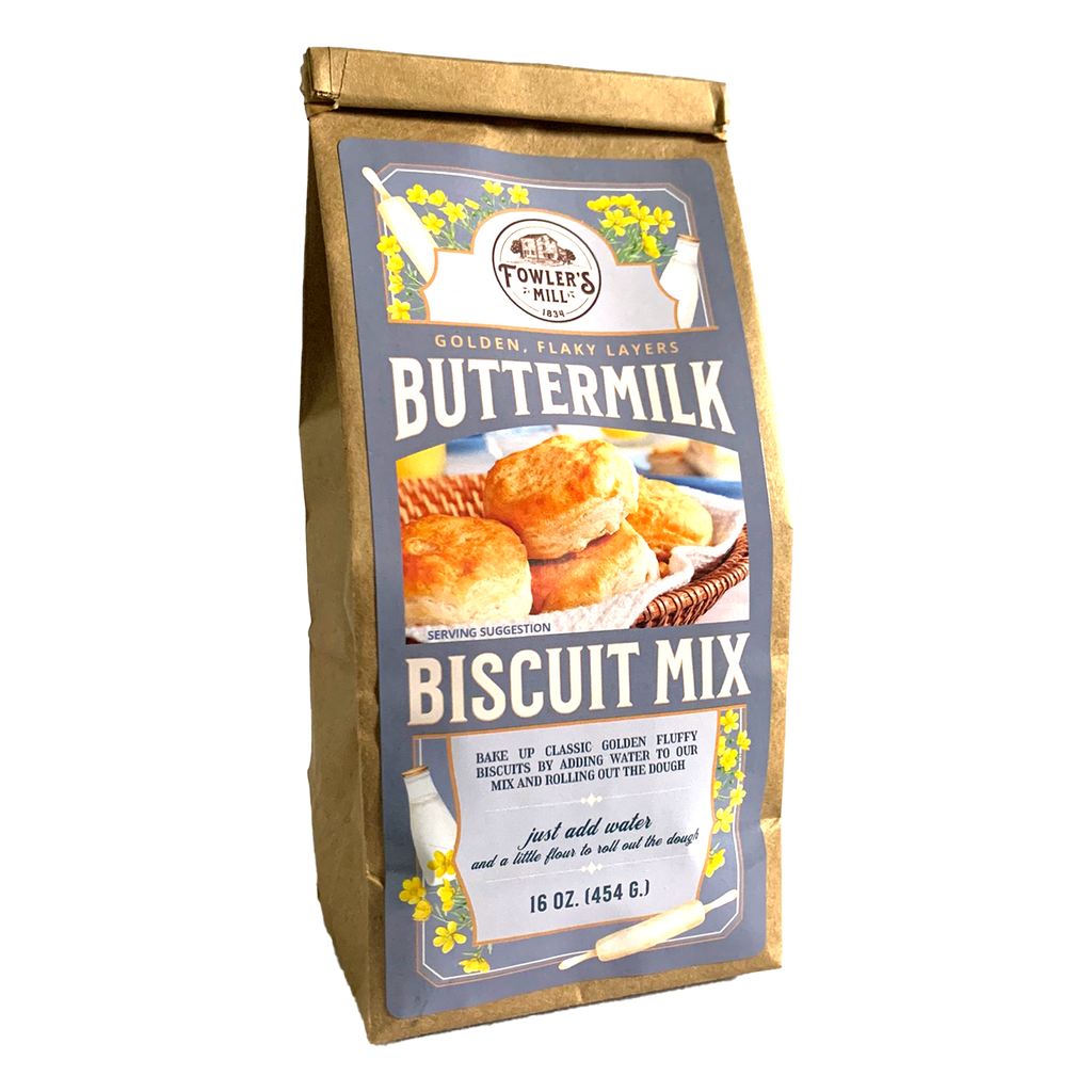 Front of Fowler's Mill Buttermilk Biscuit kraft paper bag with glossy label including fluffy golden buttermilk biscuits