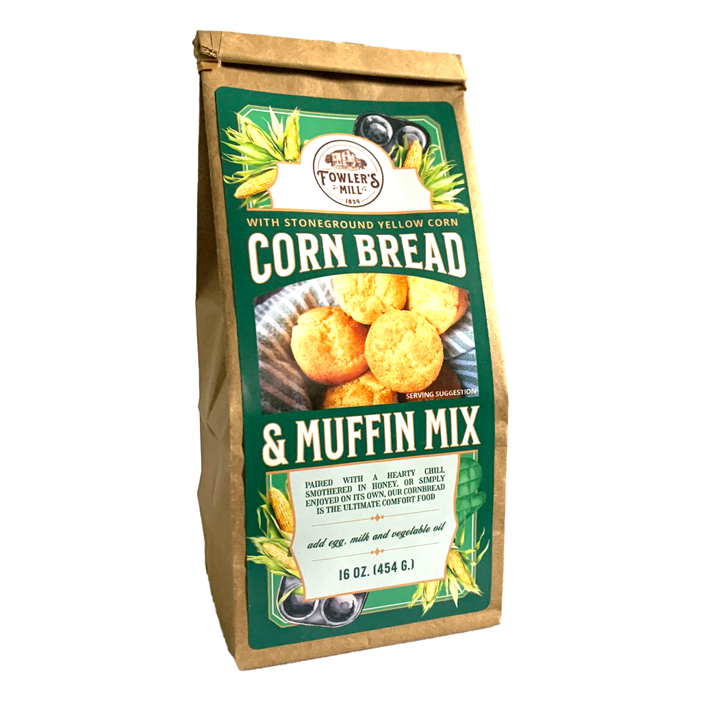 Front of Fowler's Mill Corn Bread and Muffin Mix kraft paper bag with glossy label including a basket of golden corn bread muffins