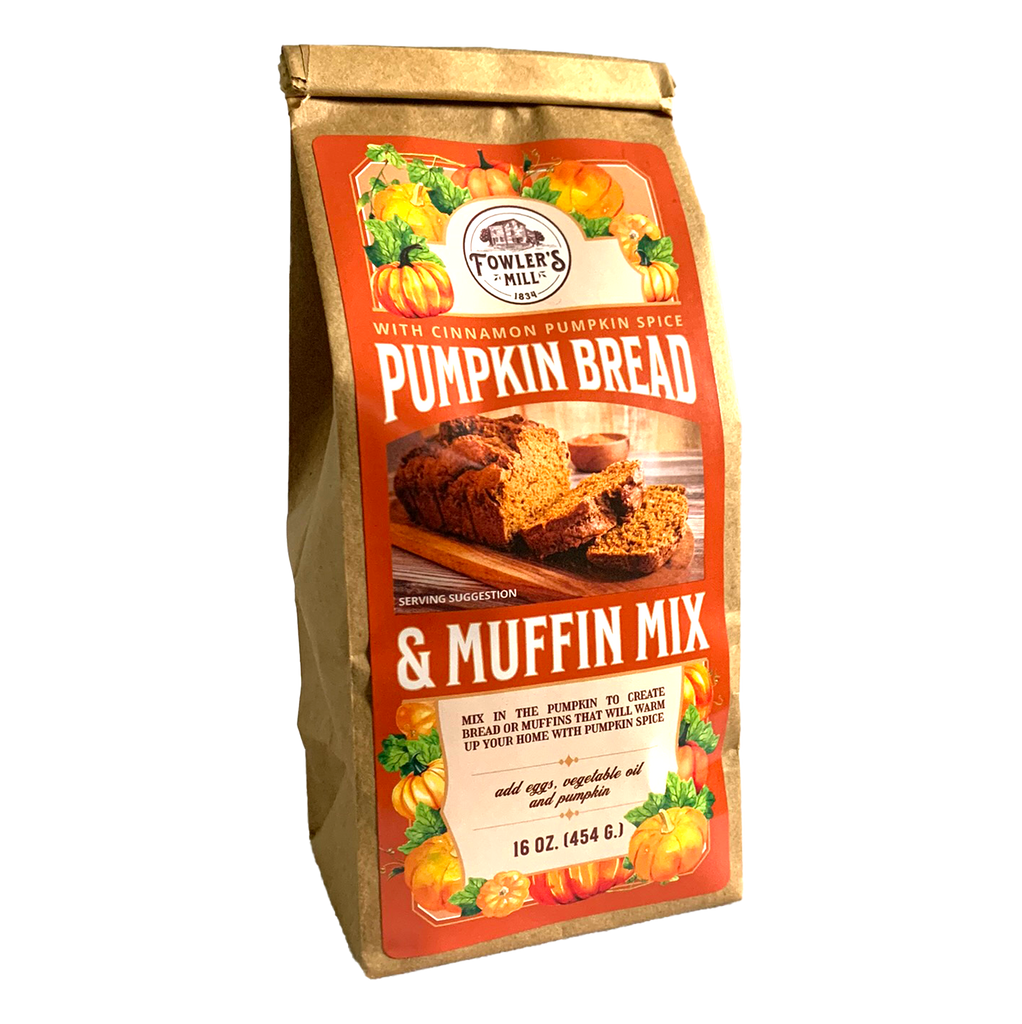 Front of Fowler's Mill Pumpkin Bread & Muffin Mix kraft paper bag with glossy labeling including a pile of pumpkins and a sliced loaf of pumpkin bread.